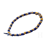 43 yellow-based and 42 dark blue glass beads, Celtic, 5th&ndash;4th century B.C.