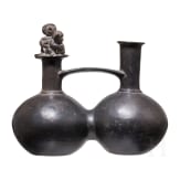 A Peruvian painted clay double-vessel, Chimu culture, probably 11th - 15th century