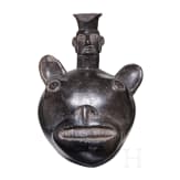 A Peruvian animal-head shaped blackware vessel, probably Chimu culture, 11th - 15th century