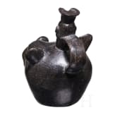 A Peruvian animal-head shaped blackware vessel, probably Chimu culture, 11th - 15th century