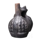 A Peruvian figural clay double-vessel, probably Chimu culture, 11th - 15th century