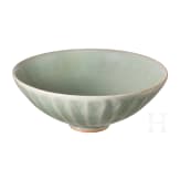 A Chinese Longquan celadon-glazed lotus bowl, probably Yuan or Ming dynasty (14th - 17th century)