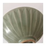 A Chinese Longquan celadon-glazed lotus bowl, probably Yuan or Ming dynasty (14th - 17th century)