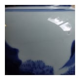 An exquisitely painted Chinese blue and white Gu vase, probably 18th century