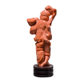 A figural coral carving showing a Chinese fisherman