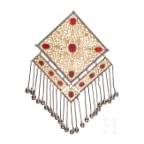 A large, partially gilt Turkmen silver and carnelian Teke pectoral ornament, circa 1900