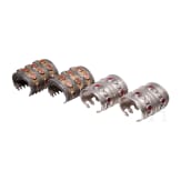 Two pairs of partially fire-gilt Turkmen silver and carnelian cuff bracelets, circa 1900