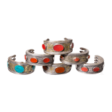 Six fire-gilt Turkmen silver and carnelian Teke bracelets, circa 1900