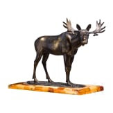 A bronze elk figure on an amber-mounted wooden stand, Hendrik Scholter, circa 1930