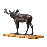 A bronze elk figure on an amber-mounted wooden stand, Hendrik Scholter, circa 1930