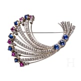 A 18ct white gold brooch set with diamonds