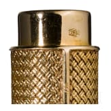 A 18ct gold evening bag and a 18ct gold atomizer, 1950s/60s