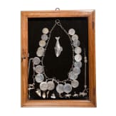 A group of German and Polish silver trinkets including a shooting champion's necklace, 19th century