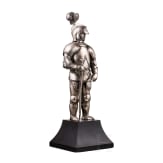 A silver figure of a knight (miniature armour)