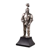 A silver figure of a knight (miniature armour)