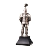 A silver figure of a knight (miniature armour)