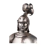 A silver figure of a knight (miniature armour)