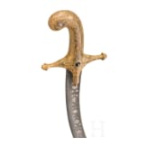 An Indian gilt-copper hilted shamshir, probably Kutch, 19th century