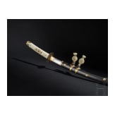 An o-wakizashi, signed Nagahiro, Momoyama period, circa 1580-1600