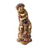 A Bali kris handle in the form of Bataru Bayu with a star sapphire, circa 1900
