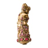 A Bali kris handle in the form of Bataru Bayu with a star sapphire, circa 1900