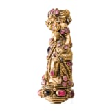 A Bali kris handle in the form of Bataru Bayu with a star sapphire, circa 1900