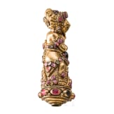A Bali kris handle in the form of Bataru Bayu with a star sapphire, circa 1900