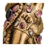 A Bali kris handle in the form of Bataru Bayu with a star sapphire, circa 1900