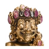 A Bali kris handle in the form of Bataru Bayu with a star sapphire, circa 1900