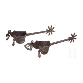 A pair of French rowell spurs in Gothic style with ciseled ornaments, 19th century