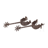 A pair of French rowell spurs in Gothic style with ciseled ornaments, 19th century