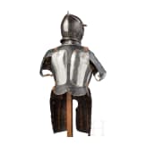 An Austrian black and white half armour for a man-at-arms, mid-16th century