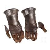 A pair of German armoured gauntlets, circa 1580