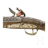 A cut and gilt flintlock pistol for the oriental market, Juste, Paris, circa 1800