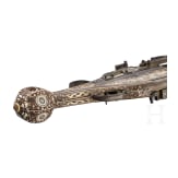 A German Victorian double-barrelled wheelock pistol, in the style of circa 1610
