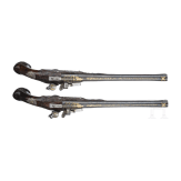 A fine pair of flintlock pistols from the armoury of the Duke of Bavaria, Charles Albert (1726-45), by Johann Gottfried Kolbe of Suhl, circa 1740