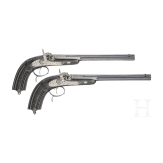 A cased pair of fine ebony stocked percussion pistols by Anton Krebs of Vienna, circa 1860