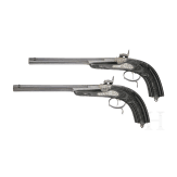 A cased pair of fine ebony stocked percussion pistols by Anton Krebs of Vienna, circa 1860
