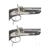 A cased pair of fine ebony stocked percussion pistols by Anton Krebs of Vienna, circa 1860