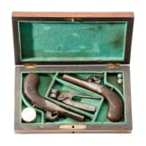A pair of percussion pocket pistols in a box, Smith, Sheffield, circa 1850