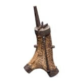 A fine South German carved staghorn powderflask with etched mountings, dated 1597