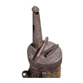A fine South German carved staghorn powderflask with etched mountings, dated 1597