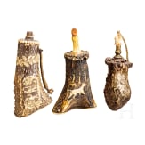 Three German powder flasks, 19th century
