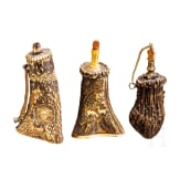 Three German powder flasks, 19th century