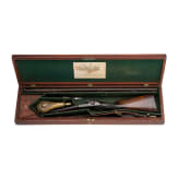 A side-by-side shotgun by J. Manton in London, with case