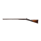 A side-by-side shotgun by J. Manton in London, with case