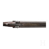 A side-by-side percussion shotgun by Purdey, with case