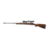 A repeating rifle system 98 with Leupold scope