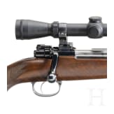 A repeating rifle system 98 with Leupold scope