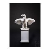A large and rare porcelain eagle on a base, Max Esser, 1931 (design), Meissen (finish)